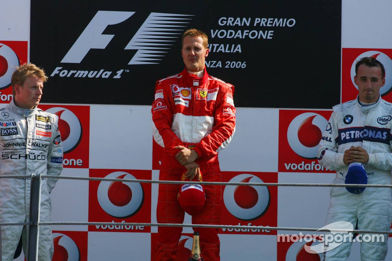 Podium: race winner Michael Schumacher with Kimi Raikkonen and Robert Kubica