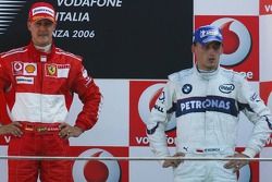 Podium: race winner Michael Schumacher with Robert Kubica