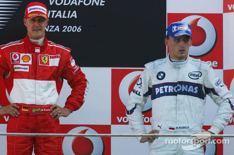 Podium: race winner Michael Schumacher with Robert Kubica