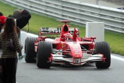 Race winner Michael Schumacher celebrates