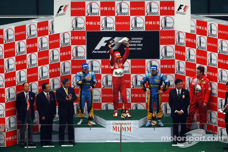 Podium: race winner Michael Schumacher with Fernando Alonso and Giancarlo Fisichella