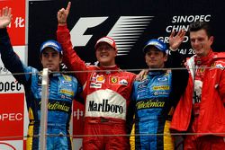 Podium: race winner Michael Schumacher with Fernando Alonso and Giancarlo Fisichella