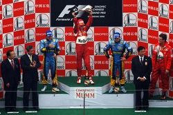 Podium: race winner Michael Schumacher with Fernando Alonso and Giancarlo Fisichella