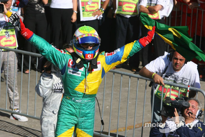 Race winner Felipe Massa celebrates