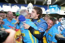 2006 F1 World Champion Fernando Alonso celebrates with Flavio Briatore