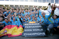 2006 F1 World Champion Fernando Alonso celebrates with Renault F1 team members