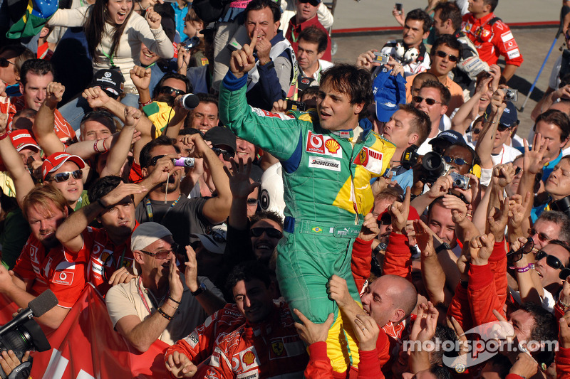 Race winner Felipe Massa celebrates