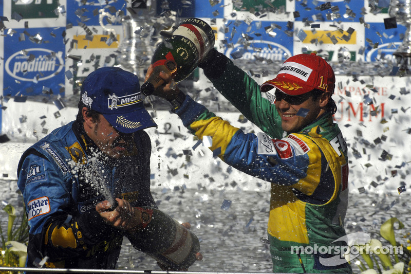 Podium: champagne for Felipe Massa and Fernando Alonso