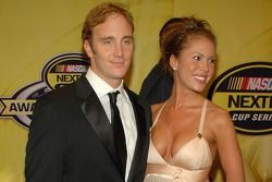 Comedian Jay Mohr and actress Nikki Cox pose for photos on the red carpet prior to the 2006 NASCAR NEXTEL Cup Series Awards Ceremony