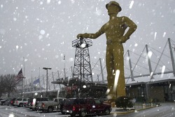 The Golden Driller stands sentry as the 21st Annual O'Reilly Chili Bowl Midget Nationals proceeds through inclement weather