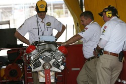NASCAR officials have a complete inspection of the motor of the NAPA Toyota of Michael Waltrip