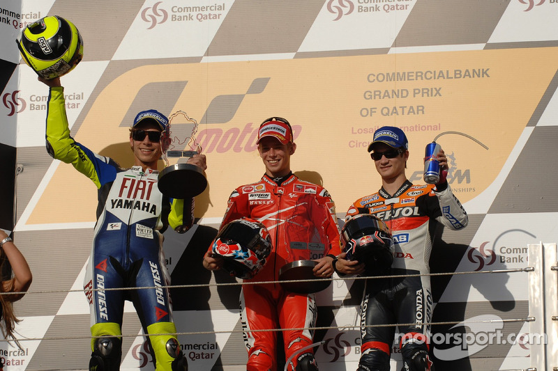 Podium: le vainqueur Casey Stoner avec Valentino Rossi et Dani Pedrosa