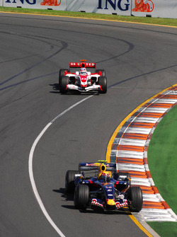 Mark Webber, Red Bull Racing, RB3 and Takuma Sato, Super Aguri F1, SA07
