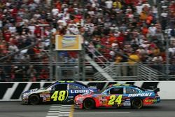 Jimmie Johnson crosses the finish line ahead of Jeff Gordon