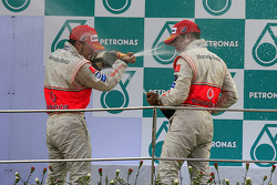 Podium: race winner Fernando Alonso with Lewis Hamilton