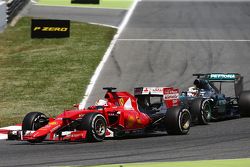Sebastian Vettel, Ferrari SF15-T and Lewis Hamilton, Mercedes AMG F1 W06 battle for position