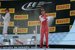 Third placed Sebastian Vettel, Ferrari celebrates with the champagne on the podium