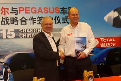 Remy Brouard, Pegasus Racing sports marketing manager and Patrice Devemy, managing director of Total Lubricants China