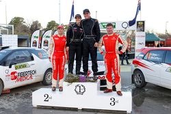 Coral Taylor, Molly Taylor, Harry Bates and Neal Bates pose on the podium after the event