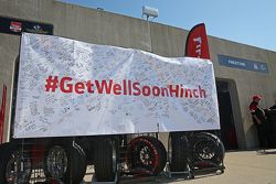 Fans sign a #GetWellHinch banner