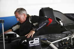 Martin Brundle has a seat fitting for a demonstration run of a GP2 car bersama 18 inch Pirelli tyre