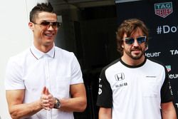 (L to R): Cristiano Ronaldo, Real Madrid Football Player with Fernando Alonso, McLaren