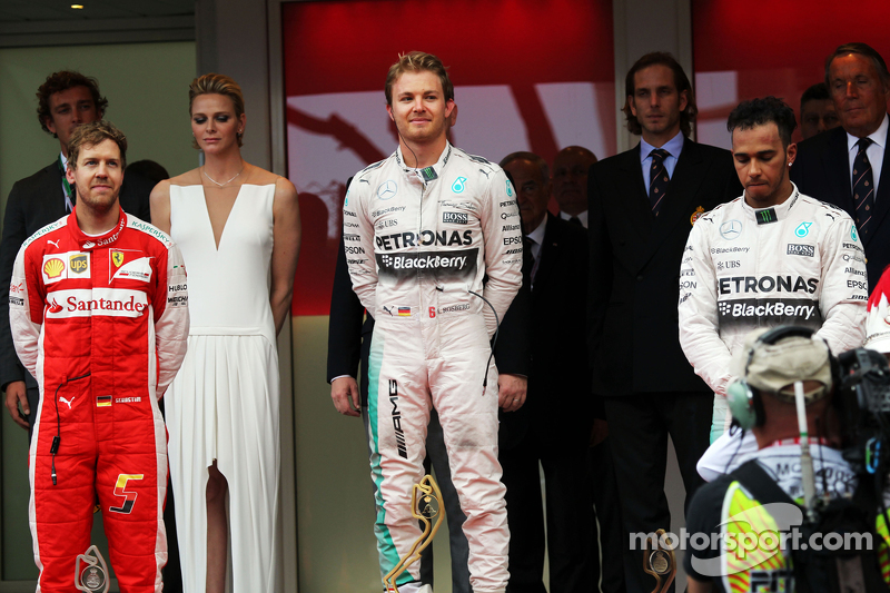 Podium: second place Sebastian Vettel, Ferrari and winner Nico Rosberg and third place Lewis Hamilto