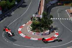 Will Stevens, Manor F1 Team leads Roberto Merhi, Manor F1 Team