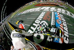Carl Edwards, Joe Gibbs Racing Toyota crossed the finish line
