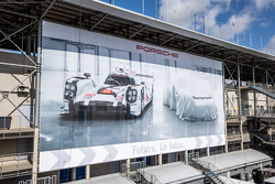 Porsche advertising banner overlooking the paddock