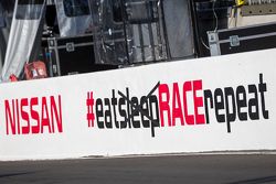 Nissan sign with 'sleep' crossed out