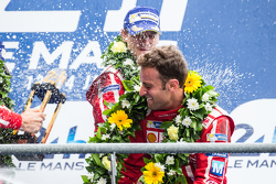 LMP1 privateer podium: Rebellion Racing Mathias Beche celebrates with champagne