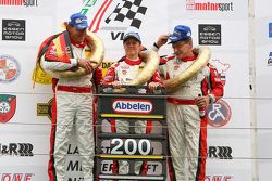 Podium: race winners Klaus Abbelen, Patrick Huisman, Sabine Schmitz, Frikadelli Racing Team