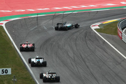 Lewis Hamilton, Mercedes AMG F1 W06 leads Sebastian Vettel, Ferrari SF15-T, Valtteri Bottas, Williams FW37 and Nico Hulkenberg, Sahara Force India F1 VJM08
