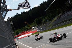 Marvin Kirchhofer, ART Grand Prix and Esteban Ocon, ART Grand Prix cross the line at the finish