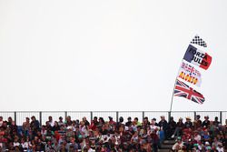 Fans and flags in the grandstand