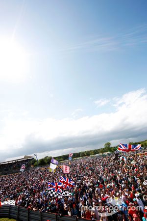 Fans invade the circuit at the podium