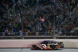 Austin Dillon, Richard Childress Racing Chevrolet and a confederate flag in the stands