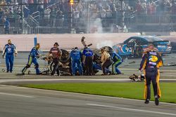 Crews tend to the wrecked car of Austin Dillon, Richard Childress Racing Chevrolet