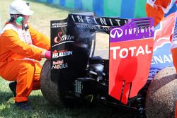 The Red Bull Racing RB11 of Daniel Ricciardo, smoking after stopping in the second practice session
