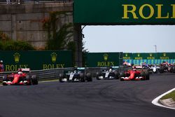 Sebastian Vettel, Ferrari SF15-T leads at the start of the race