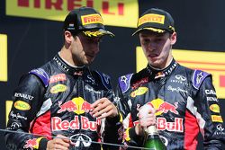 (L to R): third placed Daniel Ricciardo, Red Bull Racing with second placed team mate Daniil Kvyat, Red Bull Racing on the podium