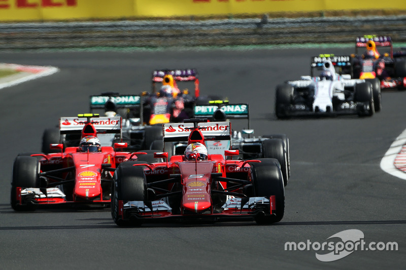 Sebastian Vettel, Ferrari SF15-T memimpin behind the FIA Safety Car