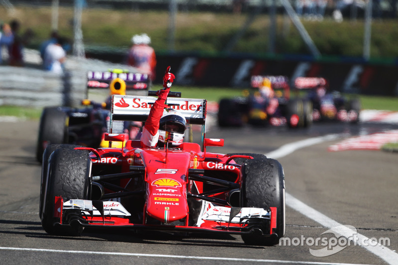 Race winner Sebastian Vettel, Ferrari SF15-T celebrates in parc ferme