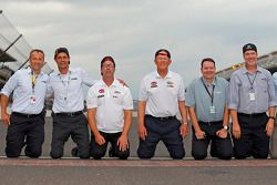 Chris Helein, Dave Alpern, J.D. Gibbs, Joe Gibbs, Todd Meredith, Byron Goggin, Joe Gibbs Racing celebrate at the yard of bricks