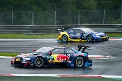 Mattias Ekström, Audi Sport Team Abt Sportsline, Audi A5 DTM leads Gary Paffett, ART Grand Prix Merc