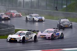 Martin Tomczyk, BMW Team Schnitzer BMW M4 DTM leads Lucas Auer, ART Grand Prix Mercedes-AMG C63 DTM