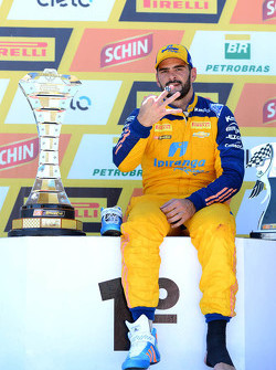 Race winner Thiago Camilo celebrates