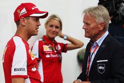 (L to R): Sebastian Vettel, Ferrari with Mark Surer