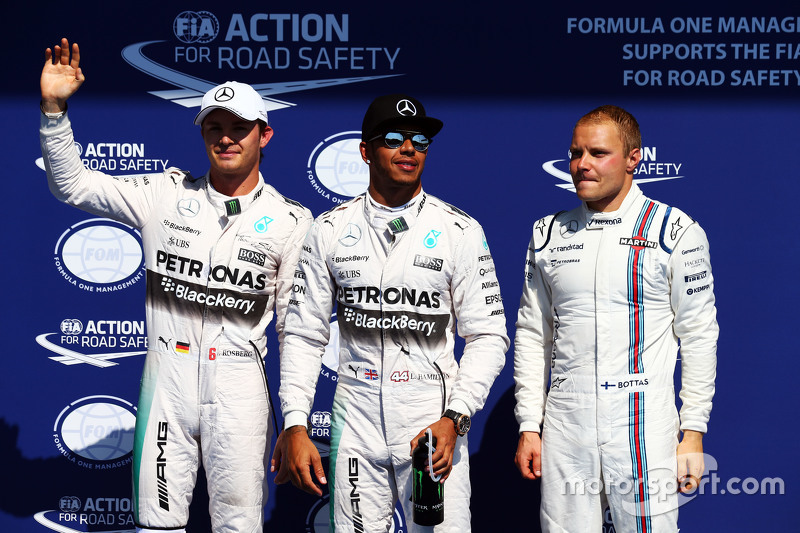 Qualifying top three in parc ferme,: Nico Rosberg, Mercedes AMG F1, second; Lewis Hamilton, Mercedes